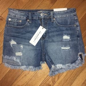 Women’s distressed denim shorts